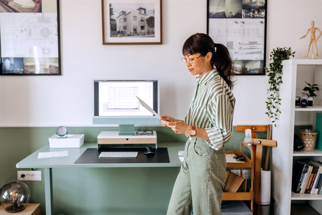 Female architect working at her home office