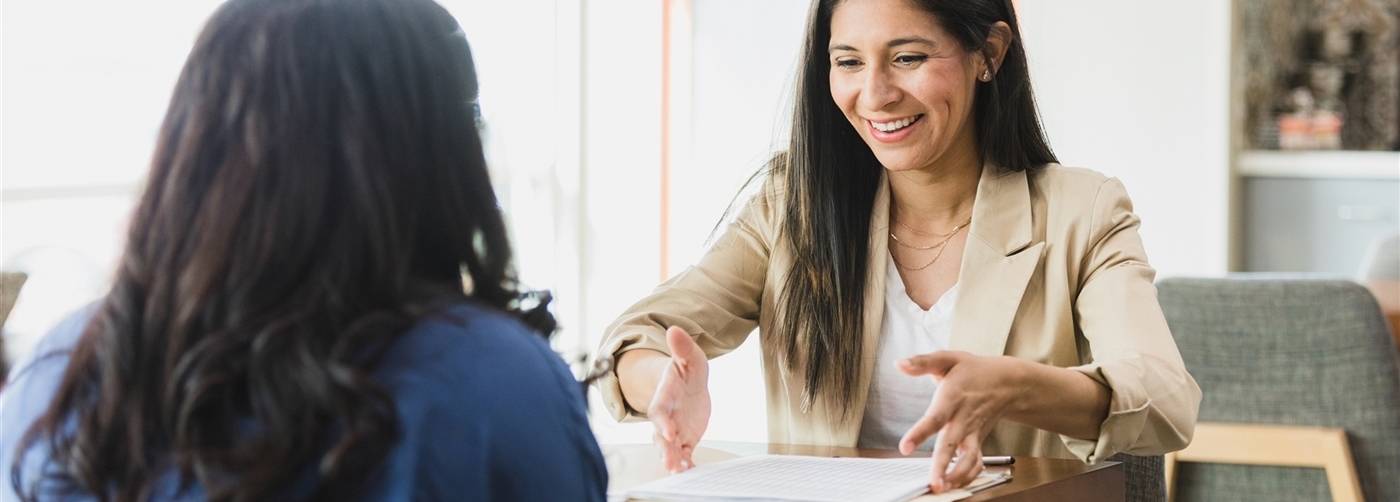 Financial counselor meeting with client